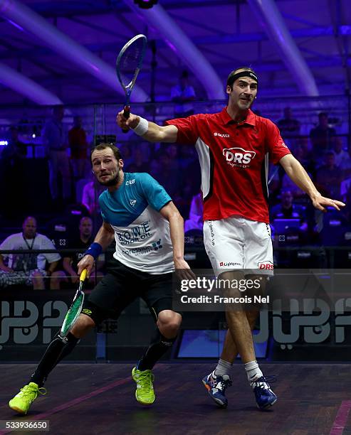 Gregory Gaultier of France competes against Simon Rosner of Germany during day one of the PSA Dubai World Series Finals 2016 at Burj Park on May 24,...