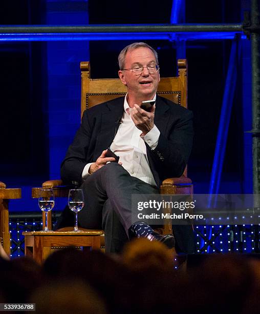 Eric Schmidt, shows his Android mobile phone during the kick-off of Startup Fest Europe on May 24, 2016 in Amsterdam, The Netherlands. The event...