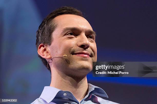 Nathan Blecharczyk, CEO of Airbnb, listens to a question of a conference goer during the kick-off of Startup Fest Europe on May 24, 2016 in...