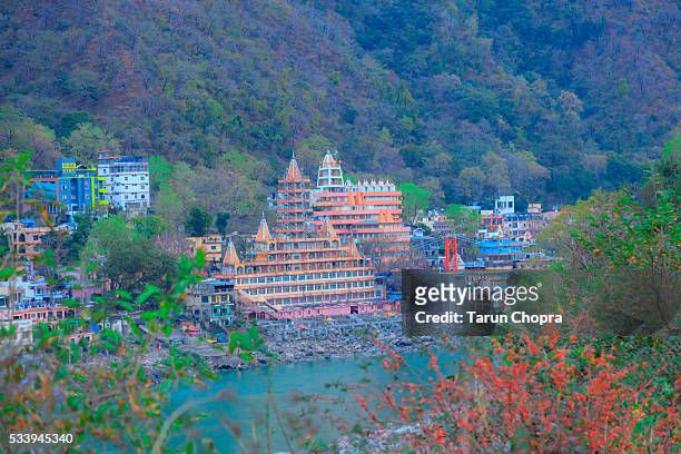 temple on river ganga - rishikesh stock pictures, royalty-free photos & images