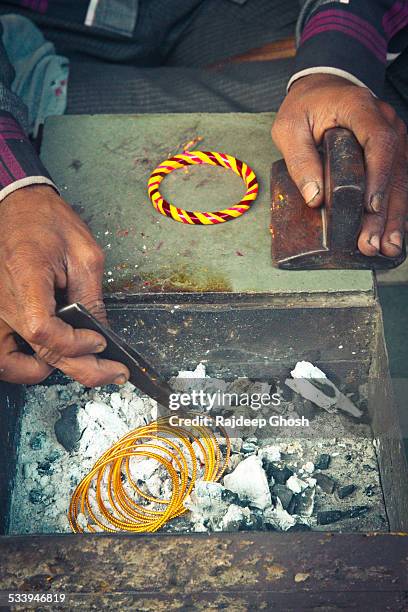 Bangle Maker 379 Bangle Maker Stock Photos, High-Res Pictures, and Images - Getty Images