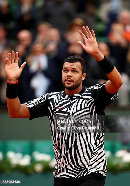 Jo-Wilfried Tsonga of France celebrates following his victory during the Men's Singles first round match against Jan-Lennard Struff of Germany on day...