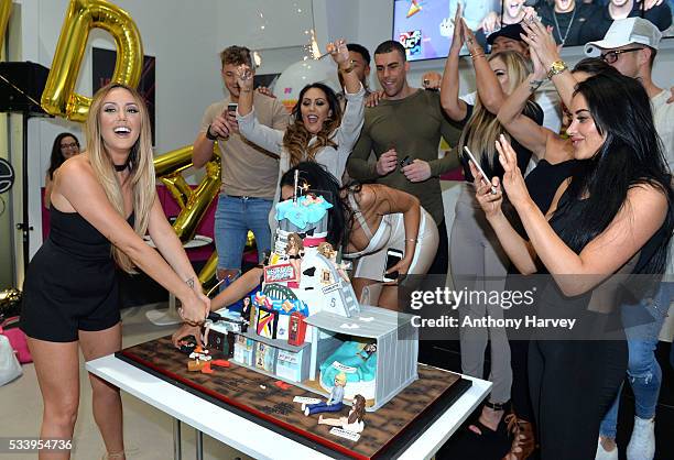 Charlotte Crosby cuts the birthday cake with Holly Hagan, Chloe Etherington, Chantelle Connelly, Marnie Simpson, Sophie Kasaei, Aaron Chalmers,...