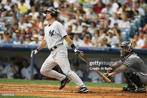 John Flaherty of the New York Yankees hits against the Chicago White Sox on August 10, 2005 at Yankee Stadium in the Bronx, New York. The White Sox...