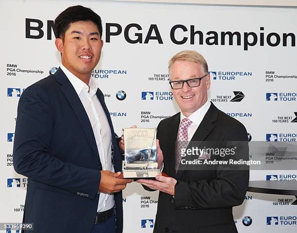 Defending Champion Byeong Hun An of South Korea receives the Challenge Tour Graduate of the Year award from The European Tour Chief Executive Keith...