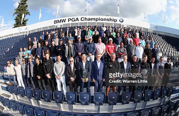 Defending Champion Byeong Hun An of South Korea poses with The European Tour Chief Executive Keith Pelley, BMW Group UK and Ireland Managing Director...