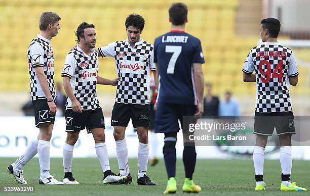 Max Verstappen of Netherlands and Red Bull Racing, and Carlos Sainz of Spain and Scuderia Toro Rosso talk to Fernando Alonso of Spain and McLaren...