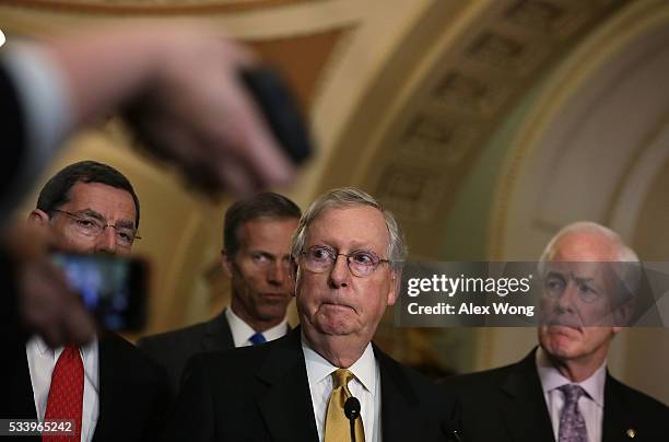 Sen. John Barrasso , Sen. John Thune , Senate Majority Leader Sen. Mitch McConnell , and Senate Majority Whip Sen. John Cornyn participate in a news...