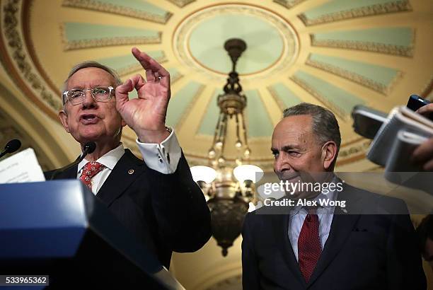 Senate Minority Leader Sen. Harry Reid and Sen. Charles Schumer participate in a news briefing after the weekly Senate Democratic Policy Committee...