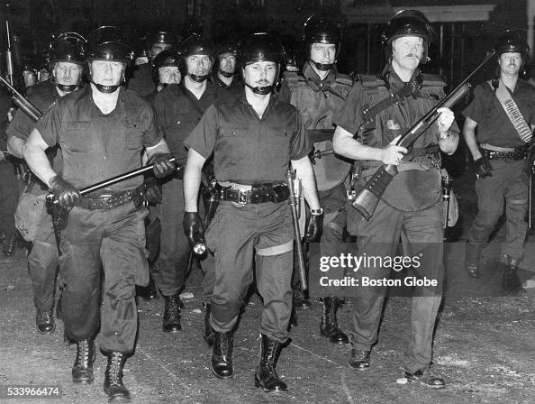 Lawrence Riots Riot police move into position as a new disturbance erupts, Aug. 9 ...