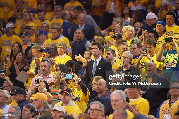 Playoffs: Golden State Warriors general manager Bob Myers in crowd with fans during Game 1 vs Oklahoma City Thunder game at Oracle Arena. Oakland, CA...