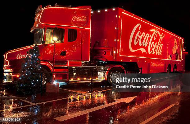 Coca Cola lorry comes into town to light up the local supermarket car park in December 2012.