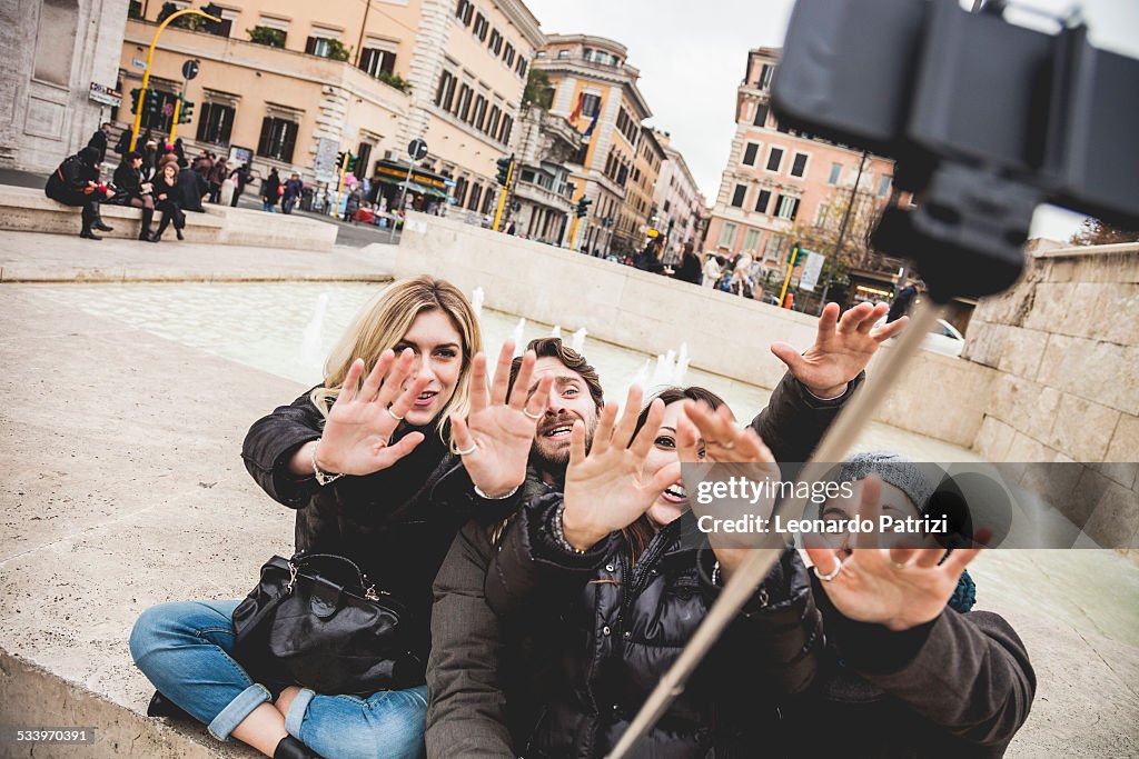People Using Selfie Sticks