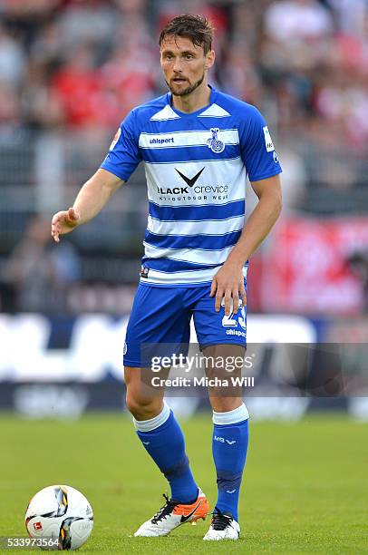 James Holland of Duisburg controls the ball during the Second Bundesliga Play Off first leg match between Wuerzburger Kickers and MSV Duisburg at...