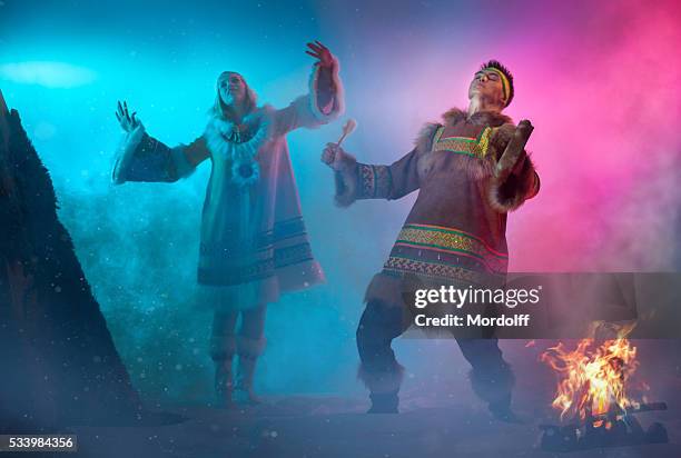 arctic dancing couple - ceremonial dancing stock pictures, royalty-free photos & images