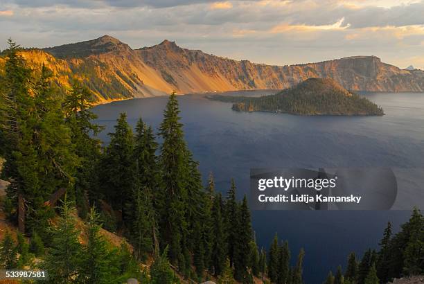 sunrise at crater lake - crater lake stock pictures, royalty-free photos & images