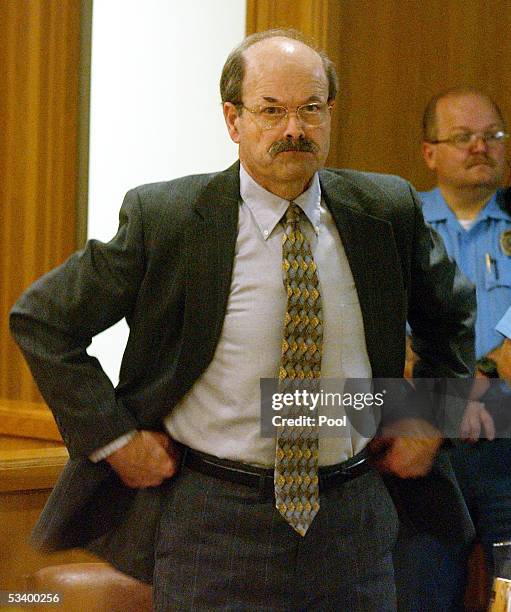 Dennis Rader, the admitted BTK serial killer, sits in court on the first day of his sentencing at the Sedgwick County Courthouse August 17, 2005 in...