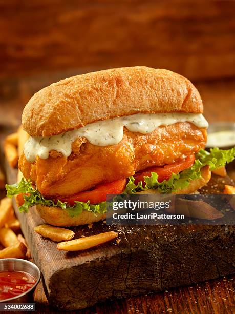 beer battered fish sandwich on a ciabatta bun - battered cod stock pictures, royalty-free photos & images