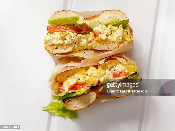 deli style egg salad bagel sandwich - sandwich top view stock pictures, royalty-free photos & images