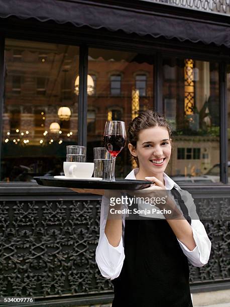 waitress carrying tray - frau mit tablett stock-fotos und bilder