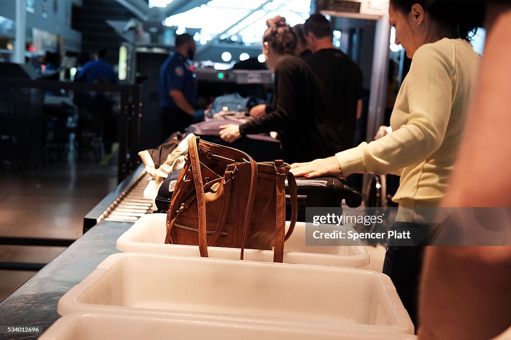 Security Line Hard People wait in a security line operated by the Transportation... News ...