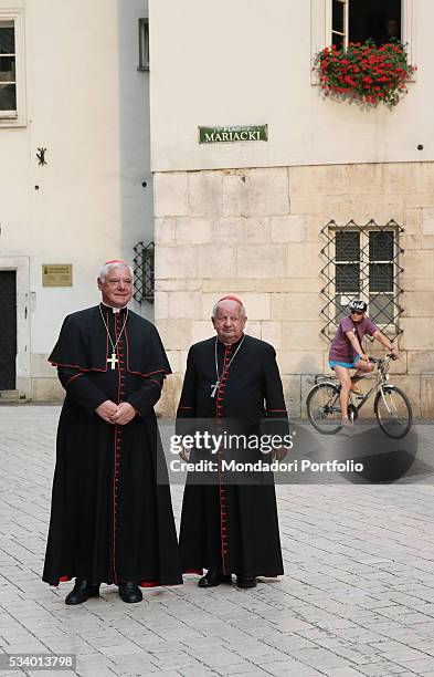 The cardinals Gerhard Ludwig Mueller and Stanislaw Dziwisz on Plac Mariacki. Krakow, Poland. 15th August 2015