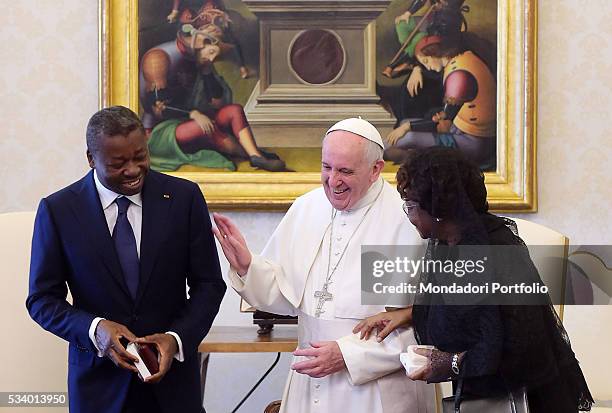 Pope Francis in a private audience with the President of Togo Faure Gnassingbé and his wife Nana Ama Kufuor in the Private Library of the Apostolic...