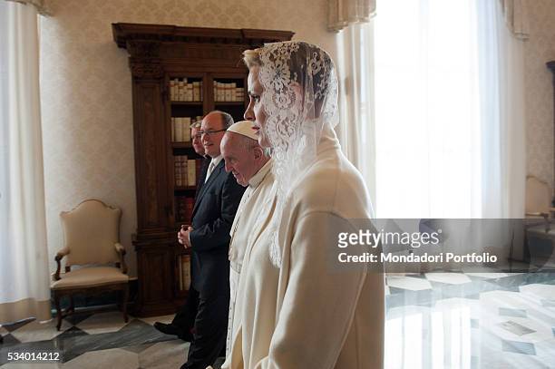 Pope Francis meeting Albert II Prince of Monaco and his wife Charlène Wittstock in the Private Library of the Apostolic Palace. Vatican City, 18th...