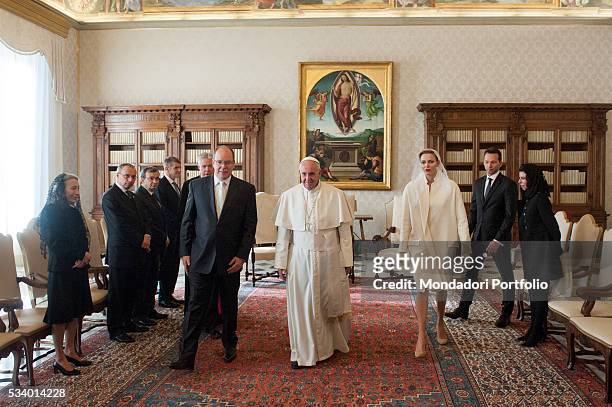 Pope Francis meeting Albert II Prince of Monaco and his wife Charlène Wittstock in the Private Library of the Apostolic Palace. Vatican City, 18th...