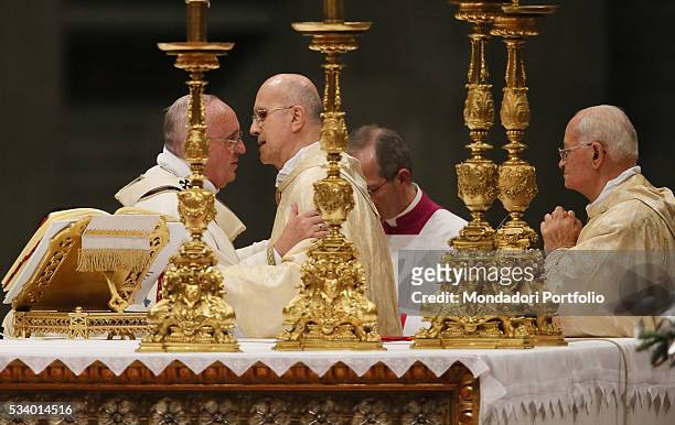 Pope Francis greeting the cardinal Tarcisio Bertone during the Christmas Night Holy Mass. Vatican City, 24th December 2015
