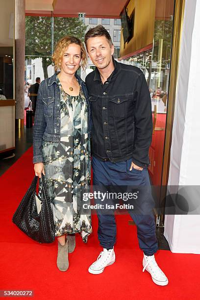 Musician Michi Beck and his wife Ulrike Fleischer attend the premiere of the film 'Seitenwechsel' at Zoo Palast on May 24, 2016 in Berlin, Germany.