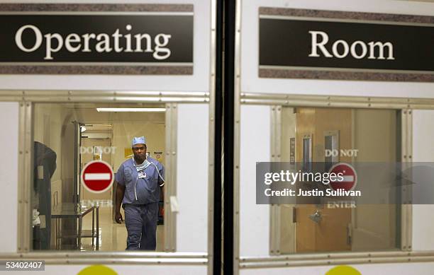 Anesthesiologist Rondall Lane walks through the halls after an operation at the UCSF Comprehensive Cancer Center August 17, 2005 in San Francisco,...