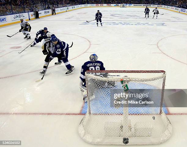Kris Letang of the Pittsburgh Penguins scores a goal against Andrei Vasilevskiy of the Tampa Bay Lightning during the second period in Game Six of...