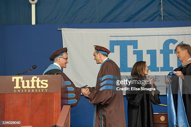 Actor Hank Azaria receives an honorary degree during commencement at Tufts University on May 22, 2016 in Boston, Massachusetts.