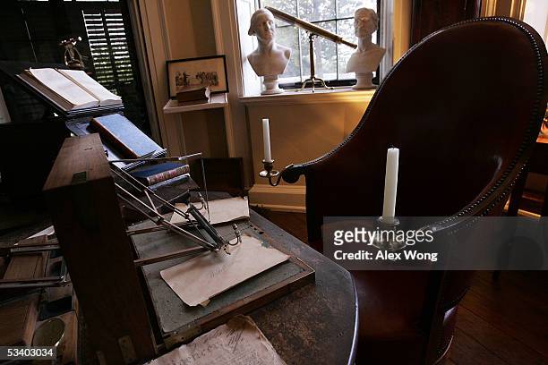 Letter-copying device with two pens attached, known as a "polygraph," lies on Thomas Jefferson's desk in the Cabinet area August 17, 2005 at...