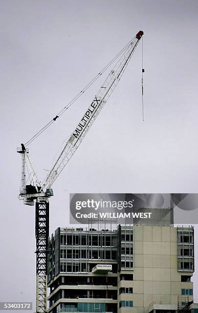 Multiplex crane lays idle against the Melbourne skyline as the Multiplex Group blamed cost blow-outs substained while building London's Wembley...