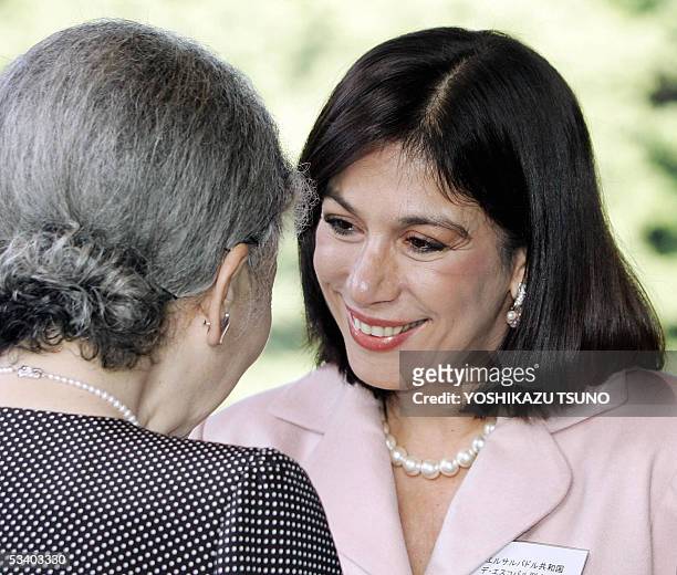 Visiting El Salvador Vice President Ana Vilma Albanez de Escobar chats with Japanese Empress Michiko as she says goodbye following a tea party at the...
