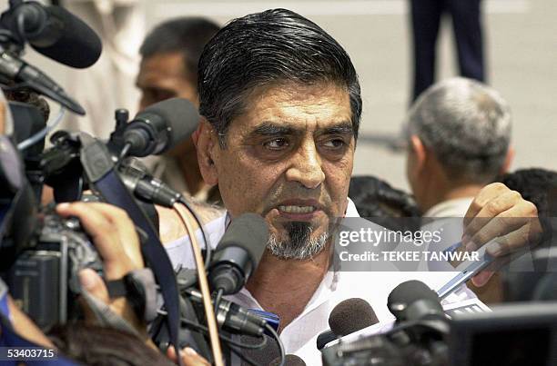 In this recent file picture taken 08 August 2005, then Minister for the Welfare of Expatriate Indians Jagdish Tytler is surrounded by media...