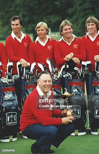 Billy Casper of the USA laughs as he lifts the Ryder Cup trophy during a photocall at the Ryder Cup at The Greenbrier Club on 14th September 1979 at...