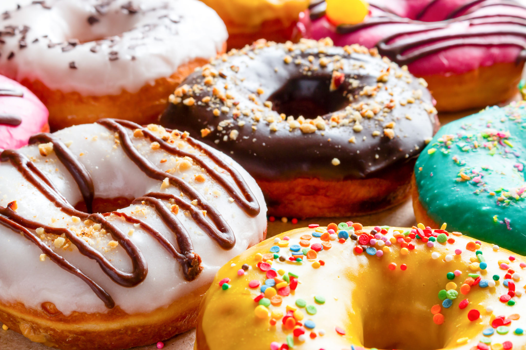 donuts in multicolored glaze close-up donuts in multicolored glaze close-up