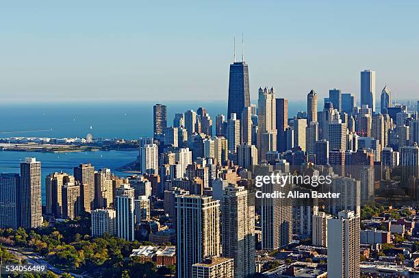 aerial cityscape of chicago and lake michigan - chicago illinois stock pictures, royalty-free photos & images