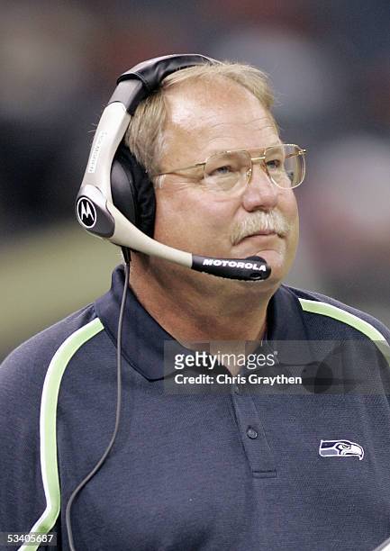 Head coach Mike Holmgren of the Seattle Seahawks walks the sideline during the preseason game against the New Orleans Saints on August 12, 2005 at...