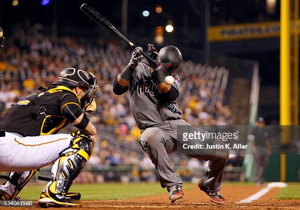 Jean Segura of the Arizona Diamondbacks is hit by a pitch in the seventh inning during the game against the Pittsburgh Pirates at PNC Park on May 24,...