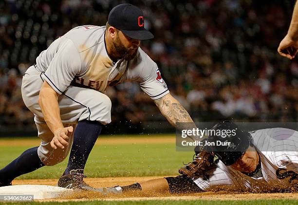 Mike Napoli of the Cleveland Indians tags out Avisail Garcia of the Chicago White Sox for the second out of a double play to end the fourth inning at...