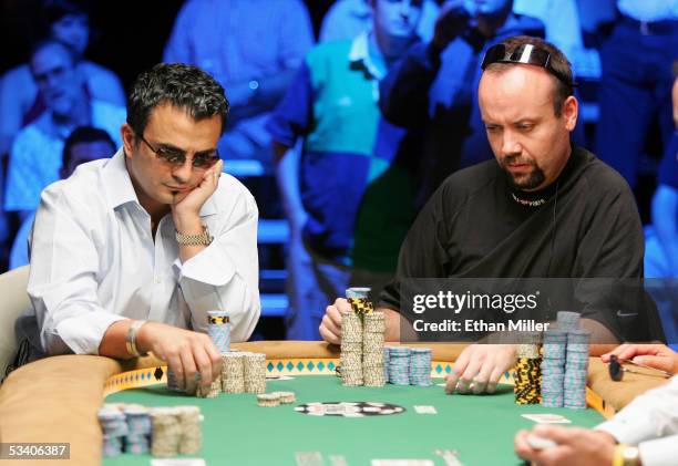 Joseph Hachem of Australia and Andrew Black of Ireland compete in the sixth round of the World Series of Poker no-limit Texas Hold 'em main event at...