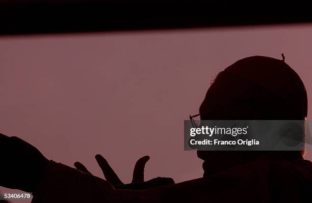 Pope Benedict XVI waves to the faithful at the Cologne Cathedral on August 18, 2005 in Cologne, Germany. Pope Benedict XVI is in his native Germany...