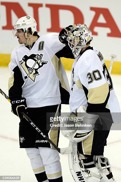 Matt Murray of the Pittsburgh Penguins celebrates with his teammate Evgeni Malkin after defeating the Tampa Bay Lightning in Game Six of the Eastern...