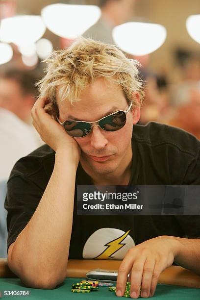 Professional poker player Phil Laak competes on the first day of the World Series of Poker no-limit Texas Hold 'em main event at the Rio Hotel &...