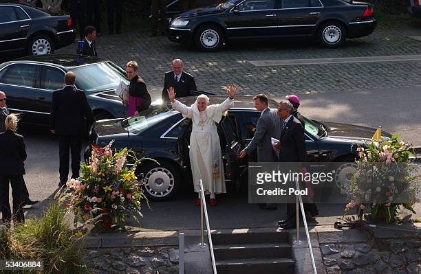 Pope Benedict XVI gestures as he arrives at the welcoming ceremony on the Poller Rheinwiesen bank on August 18, 2005 in Cologne, Germany. Pope...