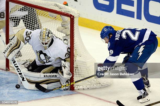 Matt Murray of the Pittsburgh Penguins makes a save against Ryan Callahan of the Tampa Bay Lightning in Game Six of the Eastern Conference Final...